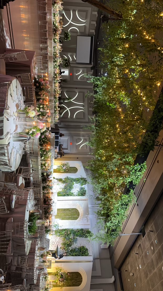 Front foyer interior at Palacio Event Centre with reflective flooring and statement lighting